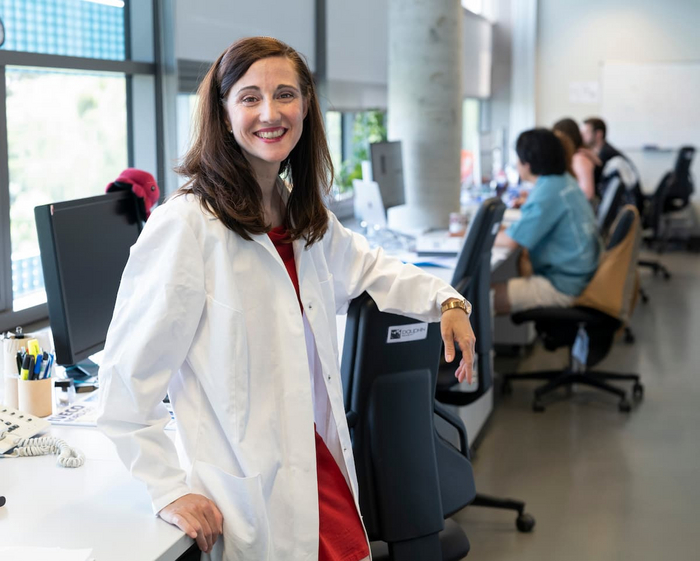 Meritxell Huch smiling in a lab coat